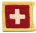 Picture of Schweizerkreuz aus Filz auf gelbem Stoff