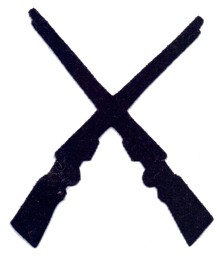 Bild von Büchsenmacher Spezialistenabzeichen 1914 / 1917 Aufschlagtuch Schweizer Armee